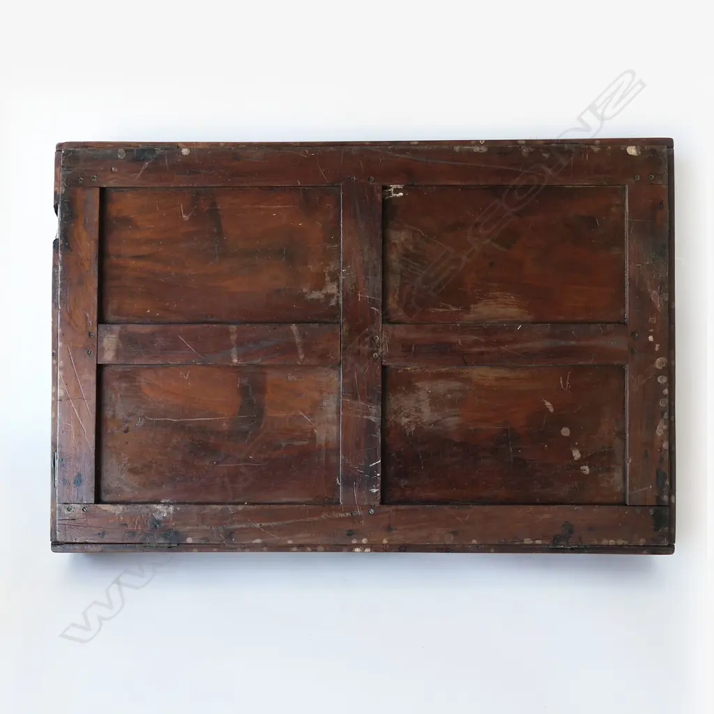 A 19thC teak campaign butler's tray table- the two-handled folding top with brass hinges supported on folding X-framed base. 770 x 510mm Image 1++