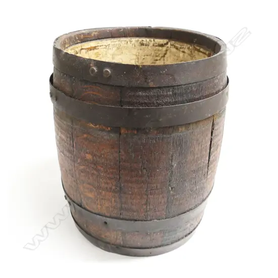A small old oak barrel with original iron bands. H.320mm