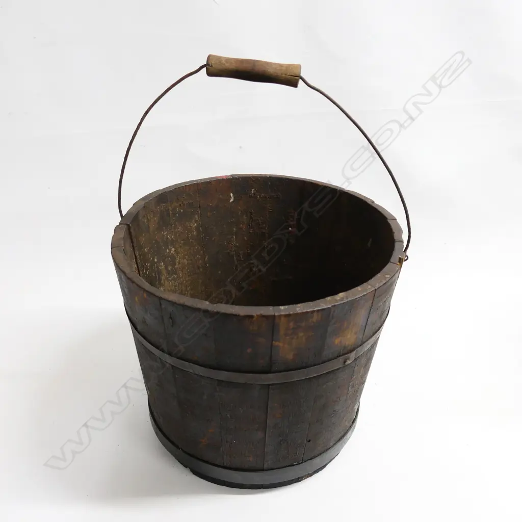 An old coopered wooden pail, with metal binding, swing handle. Dia.310mm Image 1++