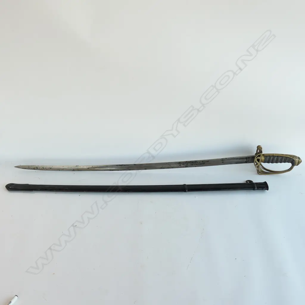 An 1822 Pattern Officer's sword with japanned steel scabbard,  brass guard with folding langet, VR crowned cypher, Image 1++