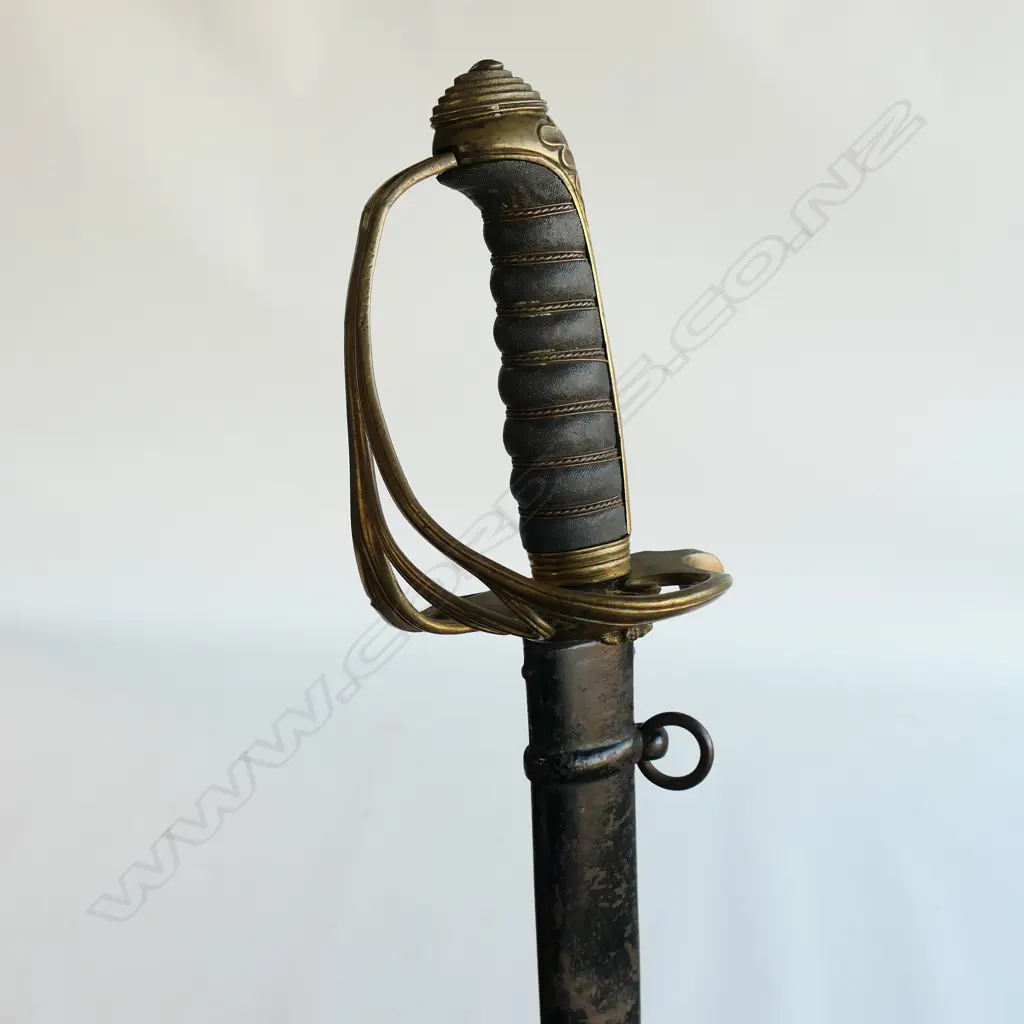 An 1822 Pattern Officer's sword with japanned steel scabbard,  brass guard with folding langet, VR crowned cypher, Image 1++