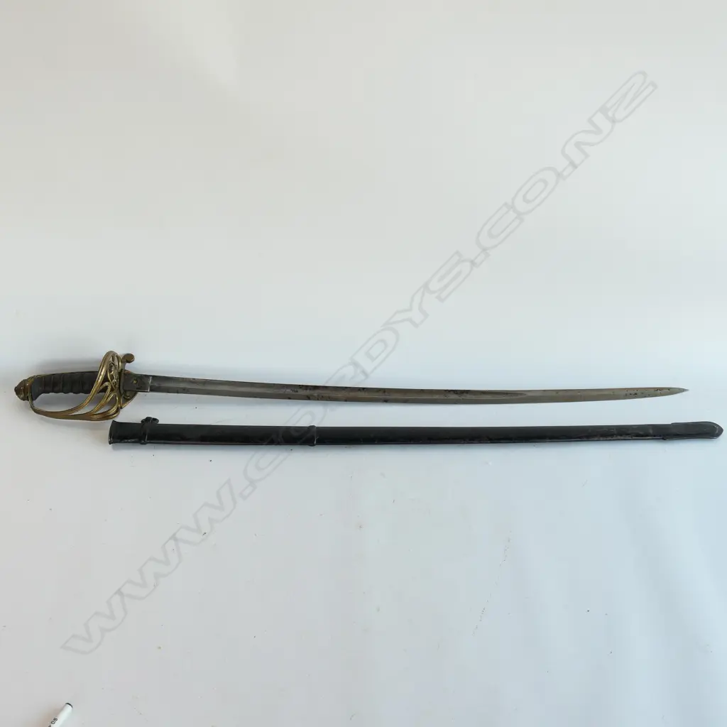 An 1822 Pattern Officer's sword with japanned steel scabbard,  brass guard with folding langet, VR crowned cypher, Image 1++