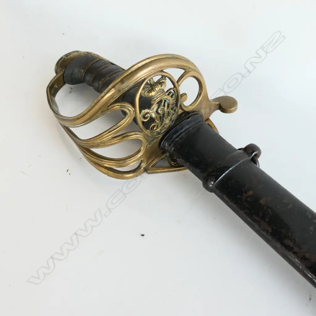 An 1822 Pattern Officer's sword with japanned steel scabbard,  brass guard with folding langet, VR crowned cypher, Image 1++