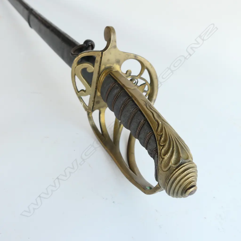 An 1822 Pattern Officer's sword with japanned steel scabbard,  brass guard with folding langet, VR crowned cypher, Image 1++