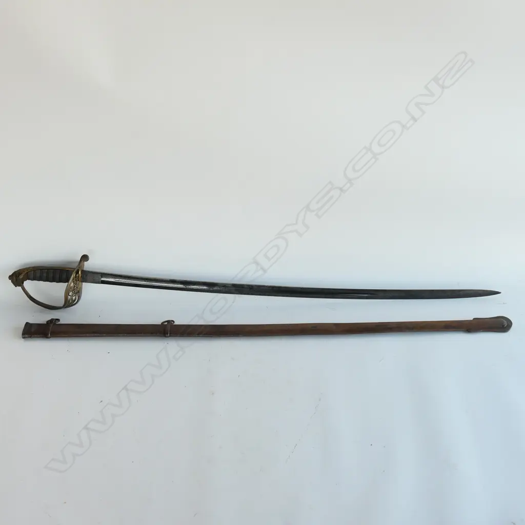 An 1822 Pattern Officer's sword with steel scabbard, brass guard with folding langet, VR crowned cypher, Image 1++