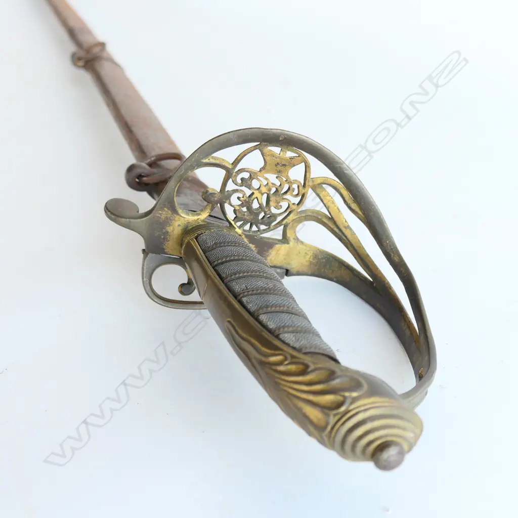 An 1822 Pattern Officer's sword with steel scabbard, brass guard with folding langet, VR crowned cypher, Image 1++