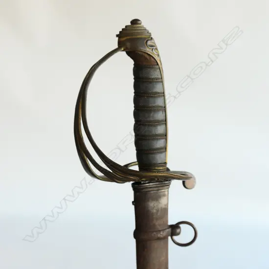 An 1822 Pattern Officer's sword with steel scabbard, brass guard with folding langet, VR crowned cypher,