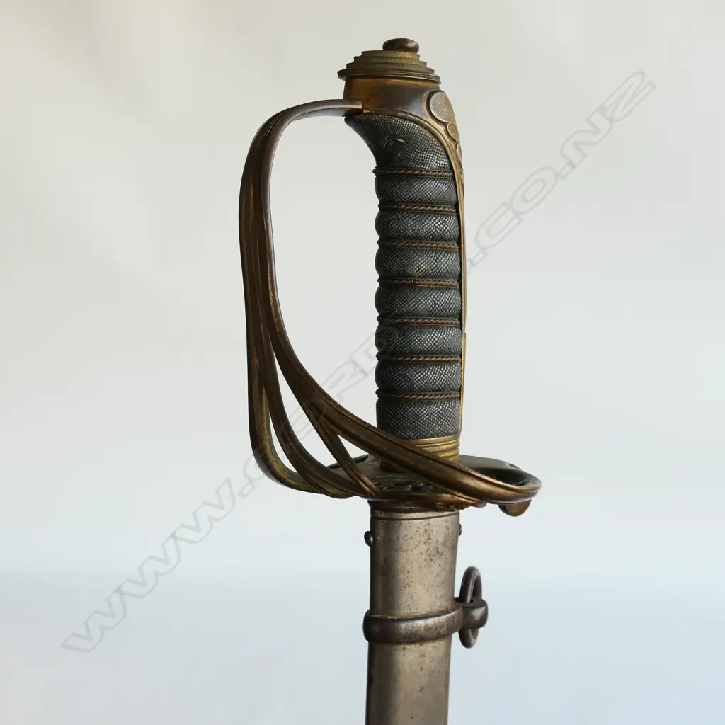 An 1822/45 Pattern Officer's sword with steel scabbard, brass guard with folding langet, VR crowned cypher, Image 1++