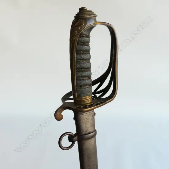 An 1822/45 Pattern Officer's sword with steel scabbard, brass guard with folding langet, VR crowned cypher,
