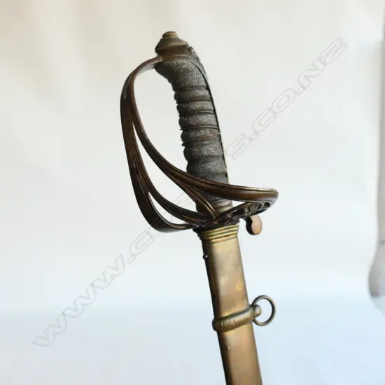 A Pattern 1822 Infantry Officer's sword and brass scabbard, with brass guard without folding langet, with VR crowned cypher,