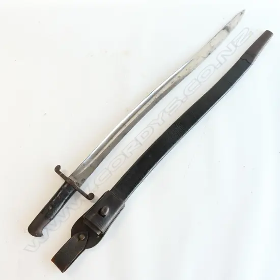 British P1856/58 Sword Bayonet with Leather Scabbard and Frog, Yataghan blade in excellent condition, leather grips good.  The leather frog marked NZ broad arrow.