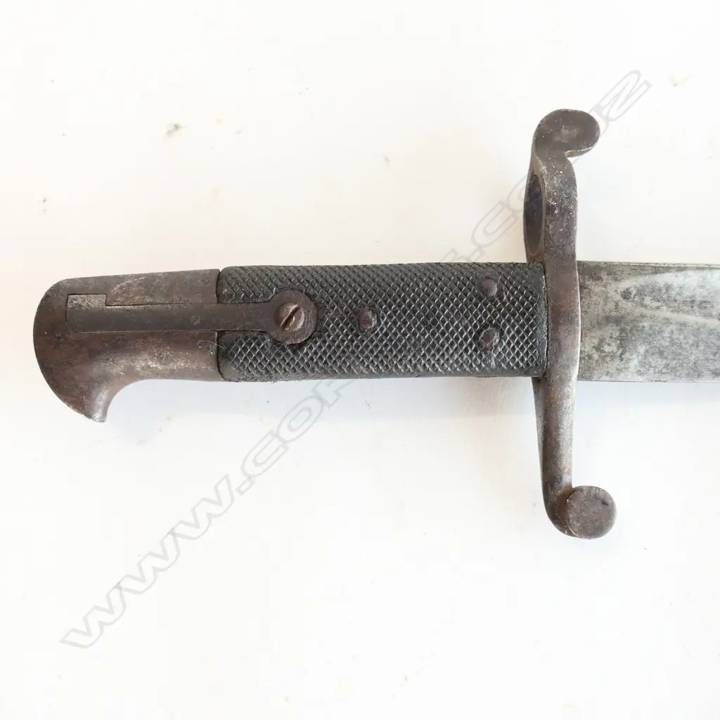 British P.1856/58 Sword Bayonet. As issued with blade and metal parts with stained aged appearance. Sound black leather and steel scabbard. Image 1++