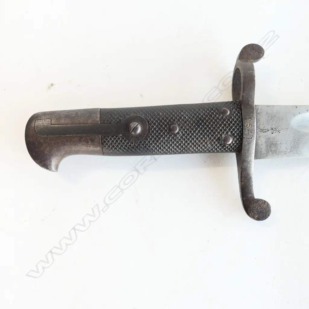 British P.1856/58 Sword Bayonet with leather scabbard, Yataghan blade with ‘WD’ and armoury markings at ricasso, number ‘0641’ on crossguard. Isolated pitting, good grips. Image 1++