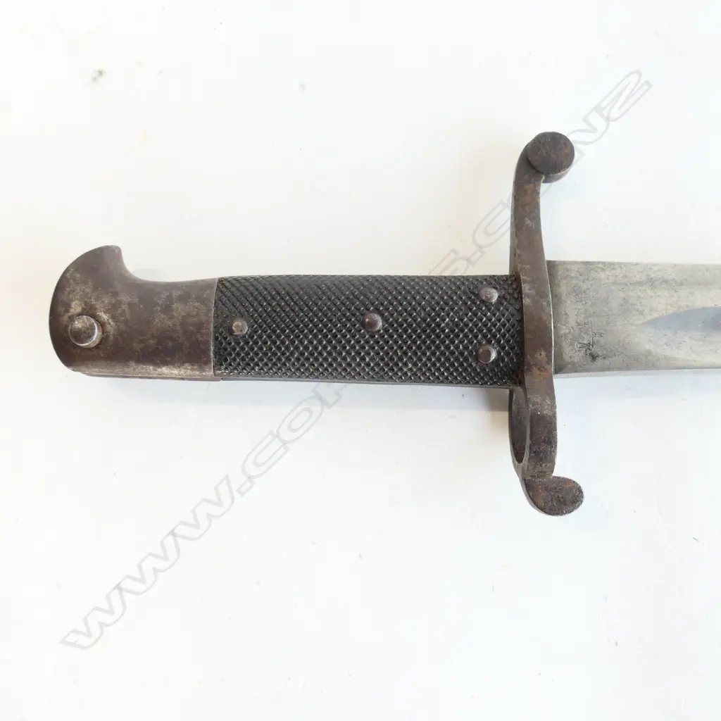 British P.1856/58 Sword Bayonet with leather scabbard, Yataghan blade with ‘WD’ and armoury markings at ricasso, number ‘0641’ on crossguard. Isolated pitting, good grips. Image 1++