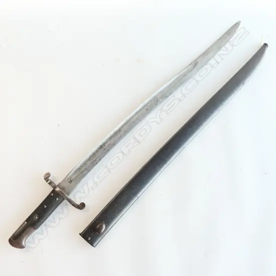British P.1856/58 Sword Bayonet, Yataghan blade with Kirschbaum, Solingen logo, good knurled leather grips complete with steel scabbard with original finish.