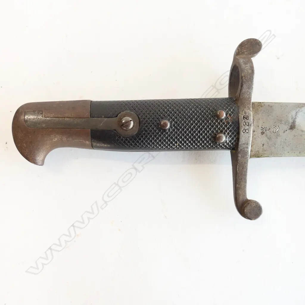 British P 1856/58 Sword Bayonet and Steel Scabbard, good leather grips. Yataghan blade in very good condition, Kirschbaum maker's logo and ‘WD’ armoury marks at ricasso, over stamped number ‘288’ at crossguard. Scabbard with surface rust. Image 1++