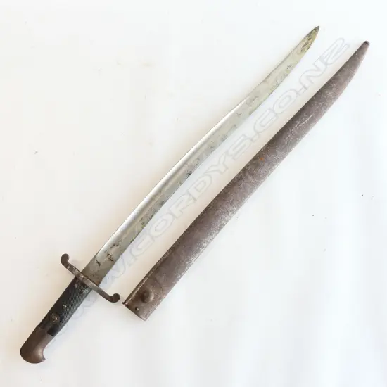 British P 1856/58 Sword Bayonet and Steel Scabbard, good leather grips. Yataghan blade in very good condition, Kirschbaum maker's logo and ‘WD’ armoury marks at ricasso, over stamped number ‘288’ at crossguard. Scabbard with surface rust.