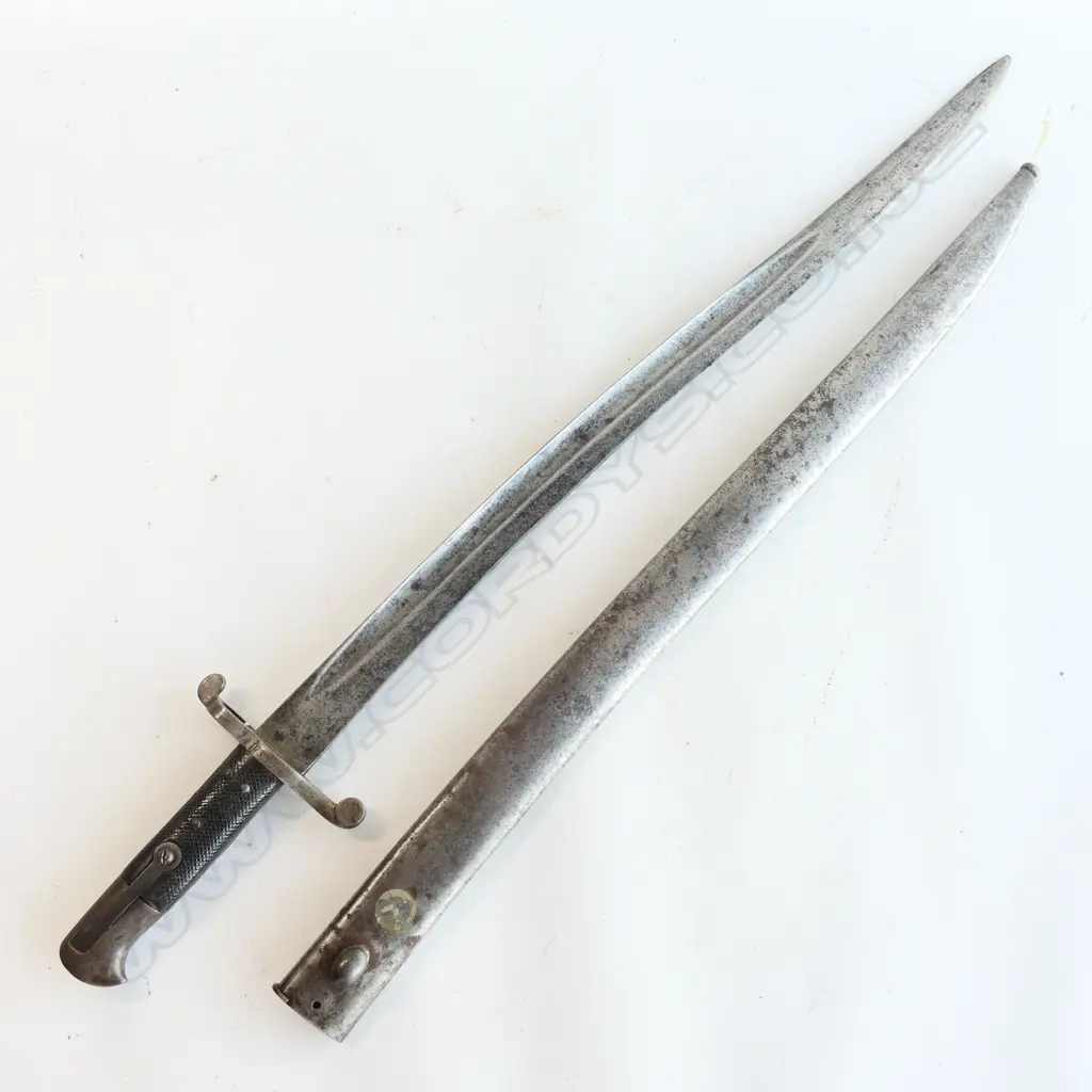 British P.1856/58 Sword Bayonet. Good leather grips. Pommel missing press-stud. Yataghan blade. Steel scabbard with one dent and one screw missing. Image 1++