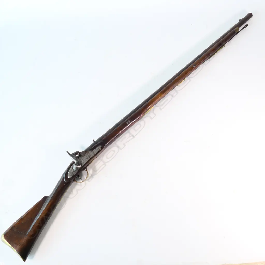 Enfield pattern 1839 percussion musket. .75 caliber, converted from Brown Bess. Brass butt plate marked broad arrow 2/65 NZ. Lock plate marked 'Crown VR Tower'. Image 1++