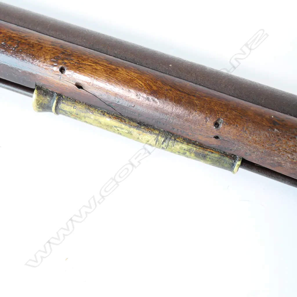Enfield pattern 1839 percussion musket. .75 caliber, converted from Brown Bess. Brass butt plate marked broad arrow 2/65 NZ. Lock plate marked 'Crown VR Tower'. Image 1++
