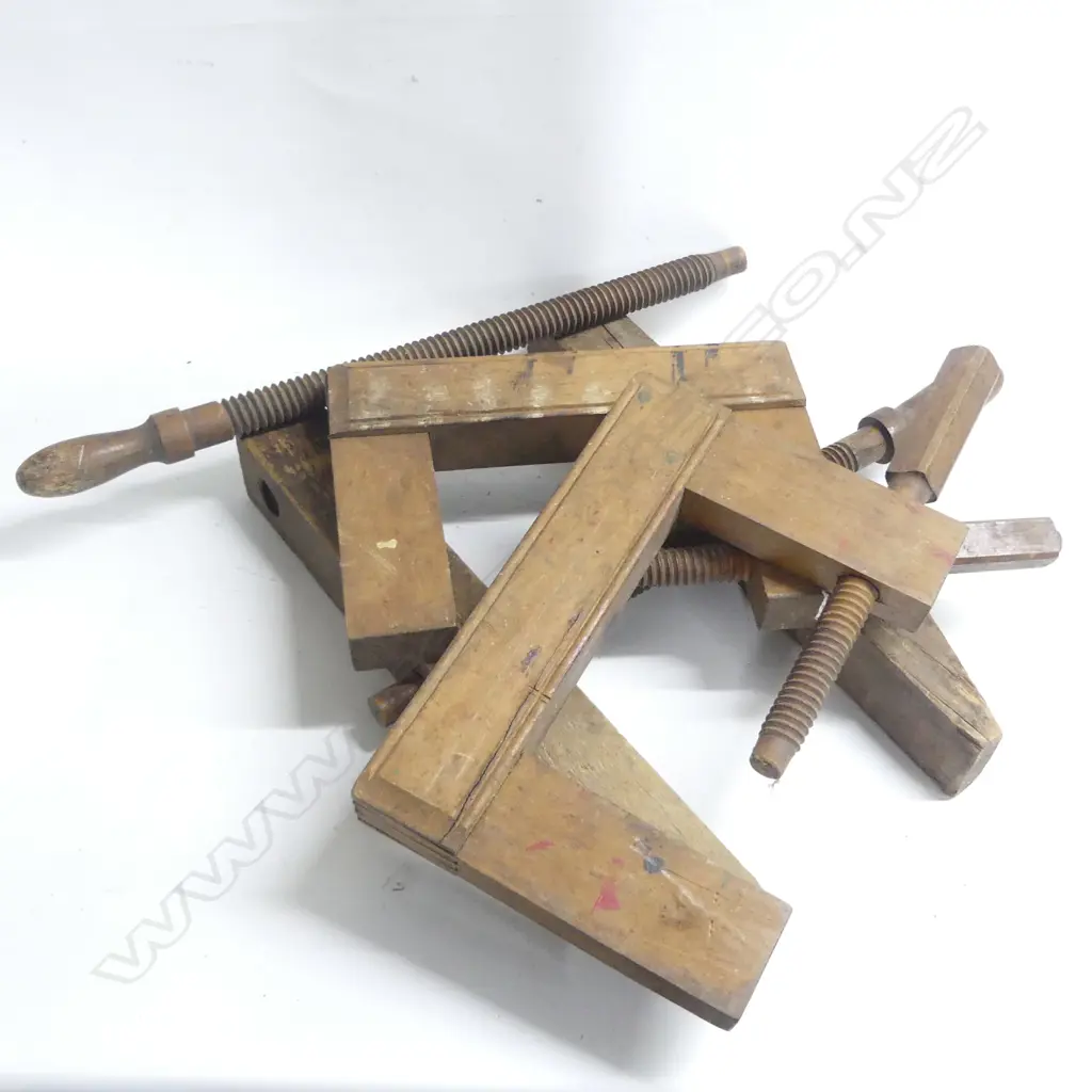 Two large wooden framed G-clamps along with a large wooden caliper clamp. Image 1++