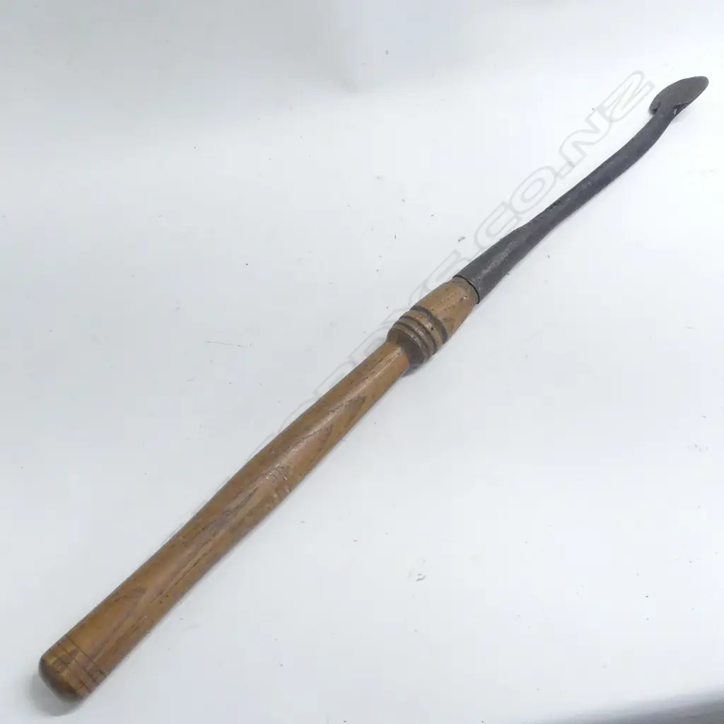 A 19thC hand forged bark spud (bark remover) the steel blade with long socket fitting to the turned oak handle. L.810mm Image 1++
