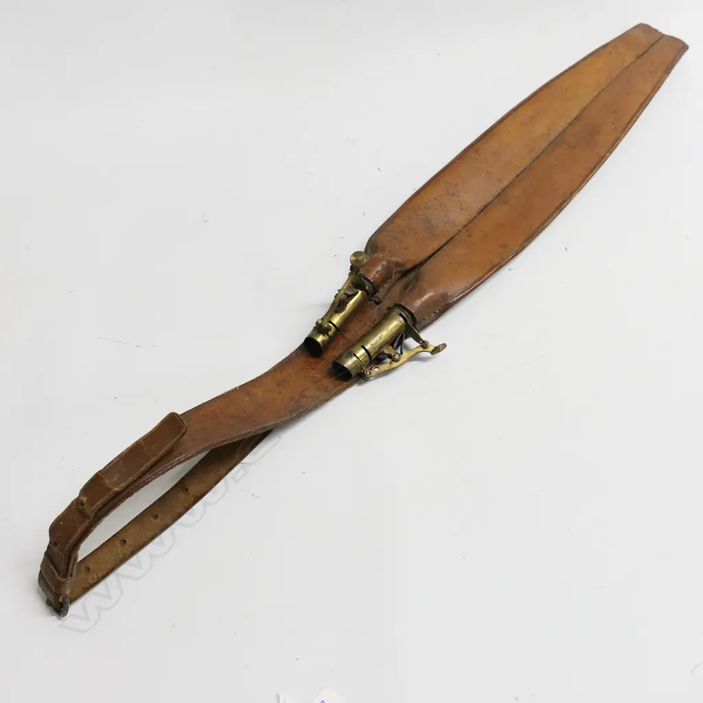 A double long leather shot charger, in fine near original condition. Image 1++
