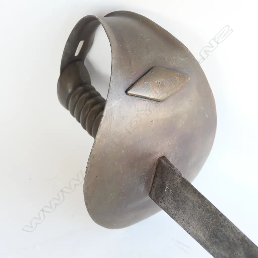 An 1845 Pattern Navy Cutlass. 685mm long, single edged blade with spear point, cleaned, shortened, WD marks and "C/88" Image 1++