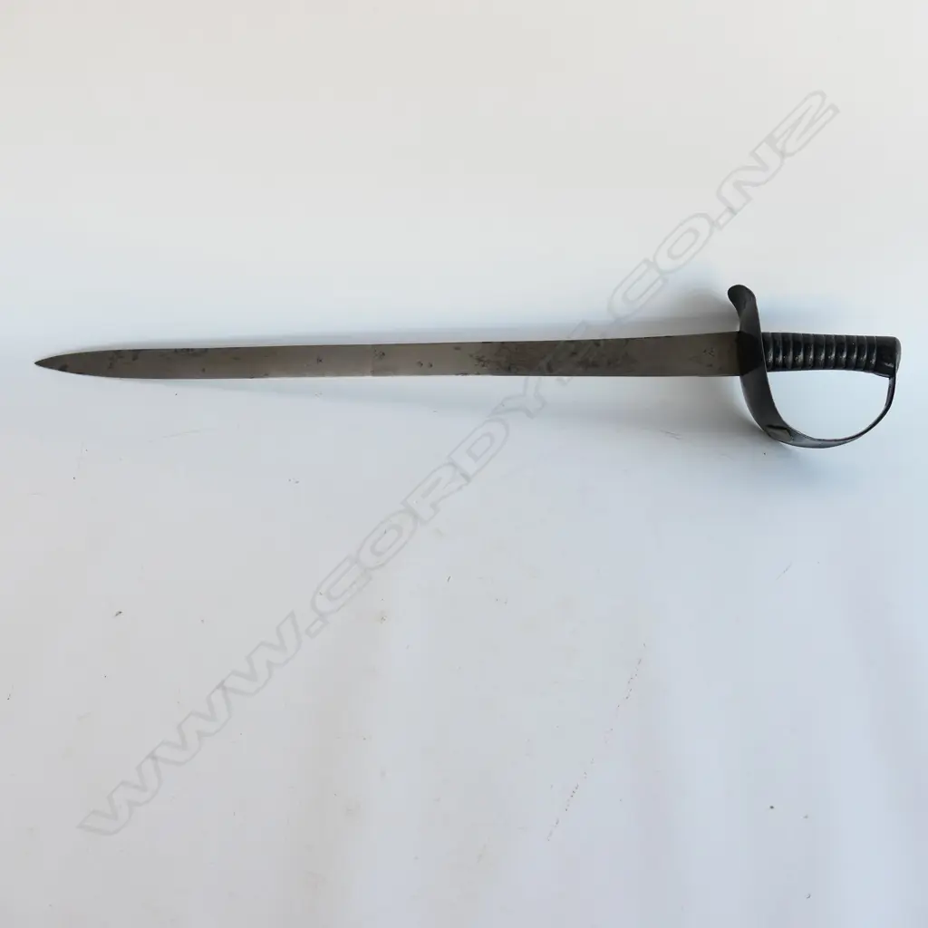 An 1845 Pattern Navy Cutlass. 635mm long, single edged blade with spear point by Robert Mole. Black painted steel bowl with diamond shaped plaque affixed marked '10' and with '53' erased, grooved cast iron grips. Mole marked to blade back, WD marks, armoury marks and C/87 at ricasso, Image 1++