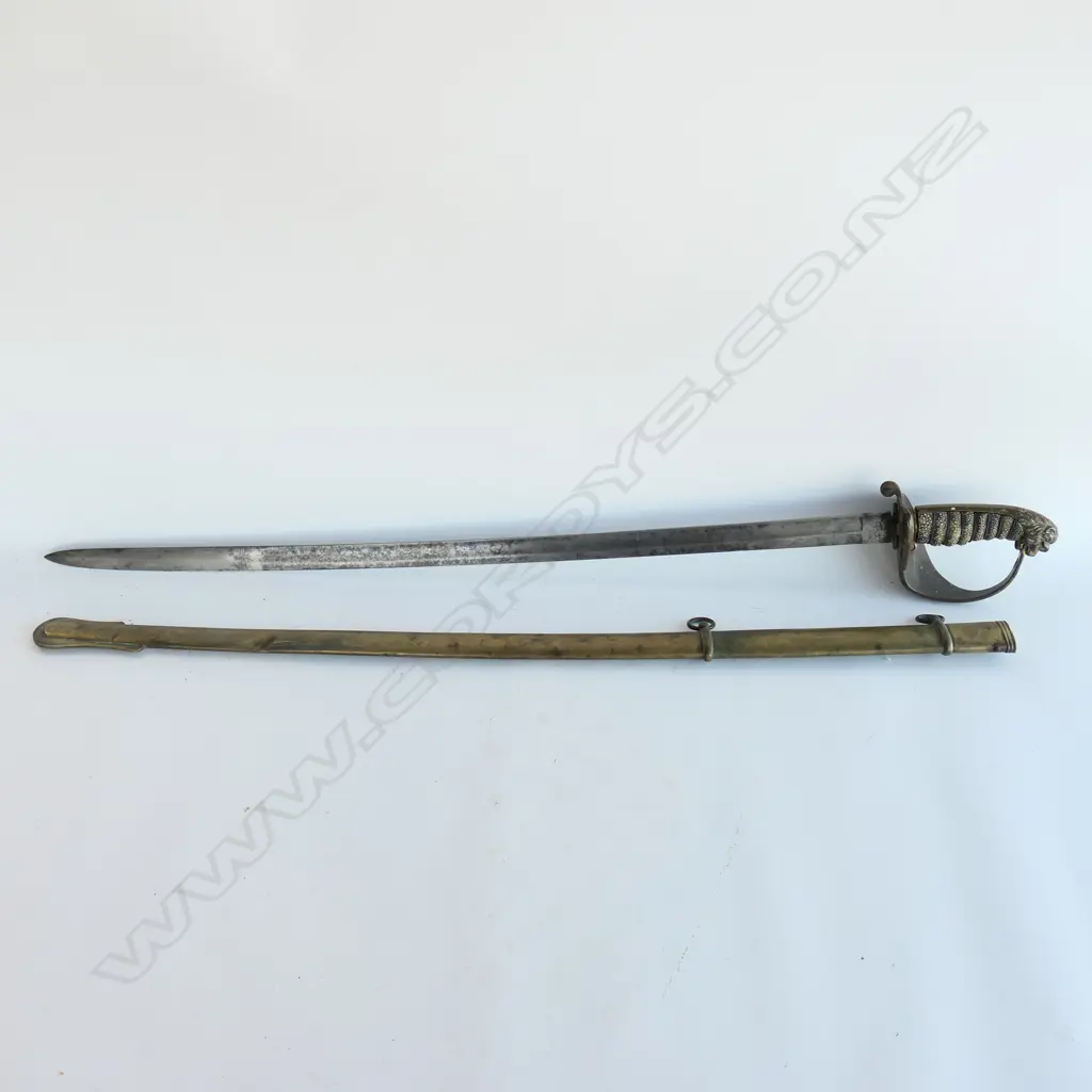 An 1827 Pattern British Naval Officer's sword with brass scabbard, the hilt with lion head pommel, Image 1++