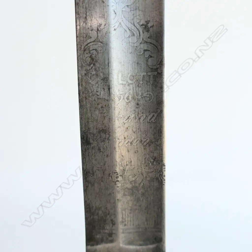 An 1827 Pattern British Naval Officer's sword with brass scabbard, the hilt with lion head pommel, Image 1++