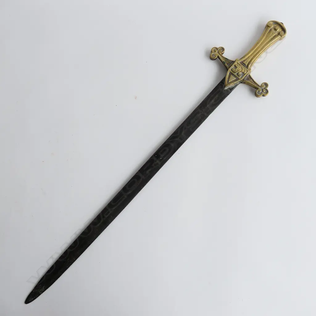 British Drummers’ Pattern 1856 Sword. 495mm slender double-edged spear point blade, brass cruciform hilt with Victorian cypher. Blade a brown patina with some pitting mainly on the point. Image 1++