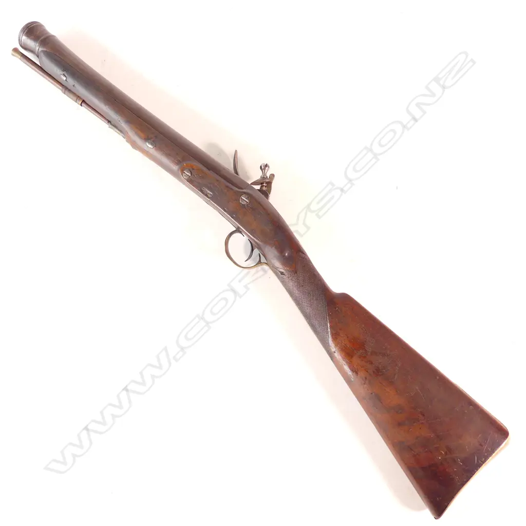 A Flintlock Blunderbuss, circa 1820-1830, walnut stock with two wedges holding 14" barrel, makers mark ‘G&S Younge’ to lock, Image 1++