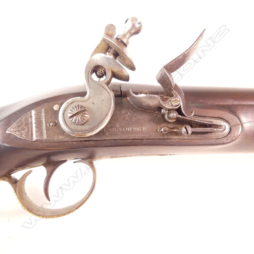 A Flintlock Blunderbuss, circa 1820-1830, walnut stock with two wedges holding 14" barrel, makers mark ‘G&S Younge’ to lock, Image 1++