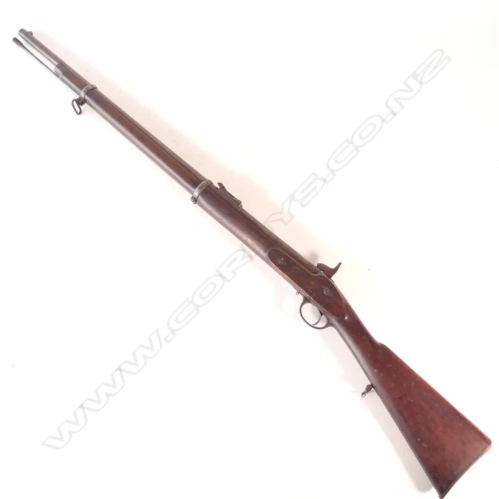 Enfield two-band Volunteer rifle 1856 pattern .577 caliber, makers mark ‘Tipping & Lawden’ to lock. Steel furniture, swivels, and cleaning rod. Pitting to barrel. NLR. Image 1++
