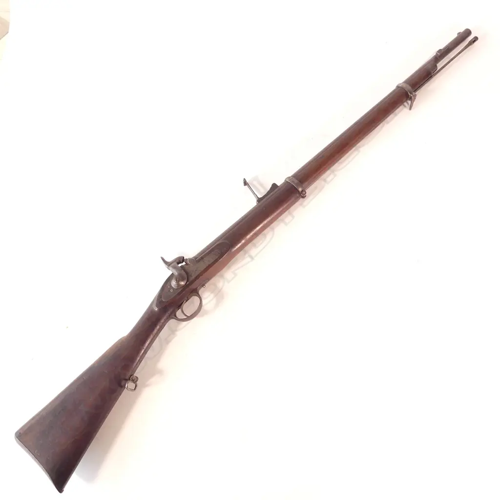 Enfield two-band Volunteer rifle 1856 pattern .577 caliber, makers mark ‘Tipping & Lawden’ to lock. Steel furniture, swivels, and cleaning rod. Pitting to barrel. NLR. Image 1++