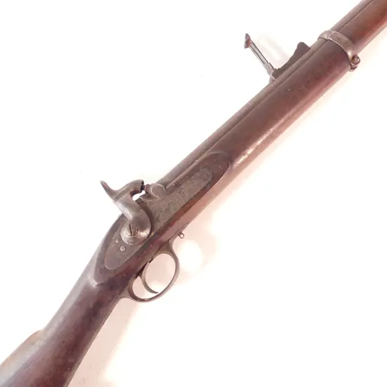 Enfield two-band Volunteer rifle 1856 pattern .577 caliber, makers mark ‘Tipping & Lawden’ to lock. Steel furniture, swivels, and cleaning rod. Pitting to barrel. NLR.