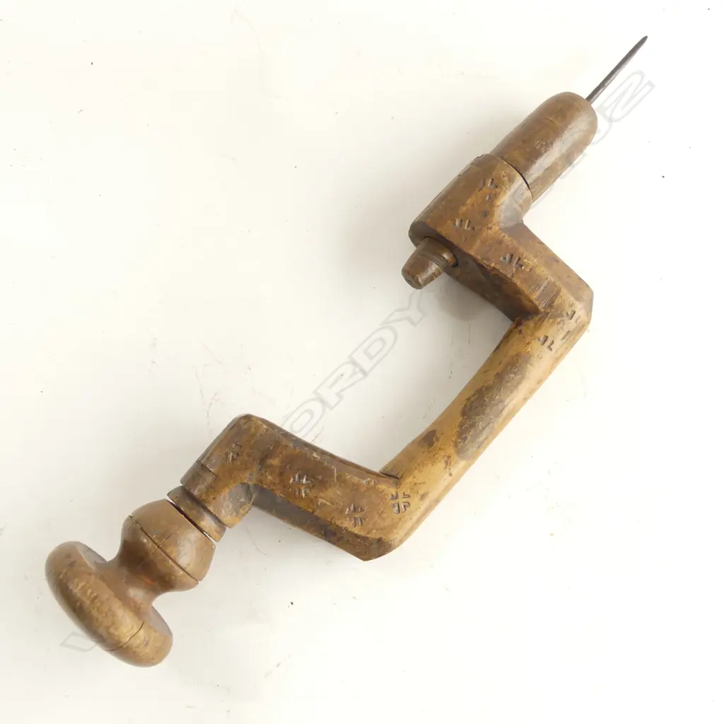 Totally wooden brace. Removeable wooden chuck with fitted bit. Unique reverse screw threads. Image 1++