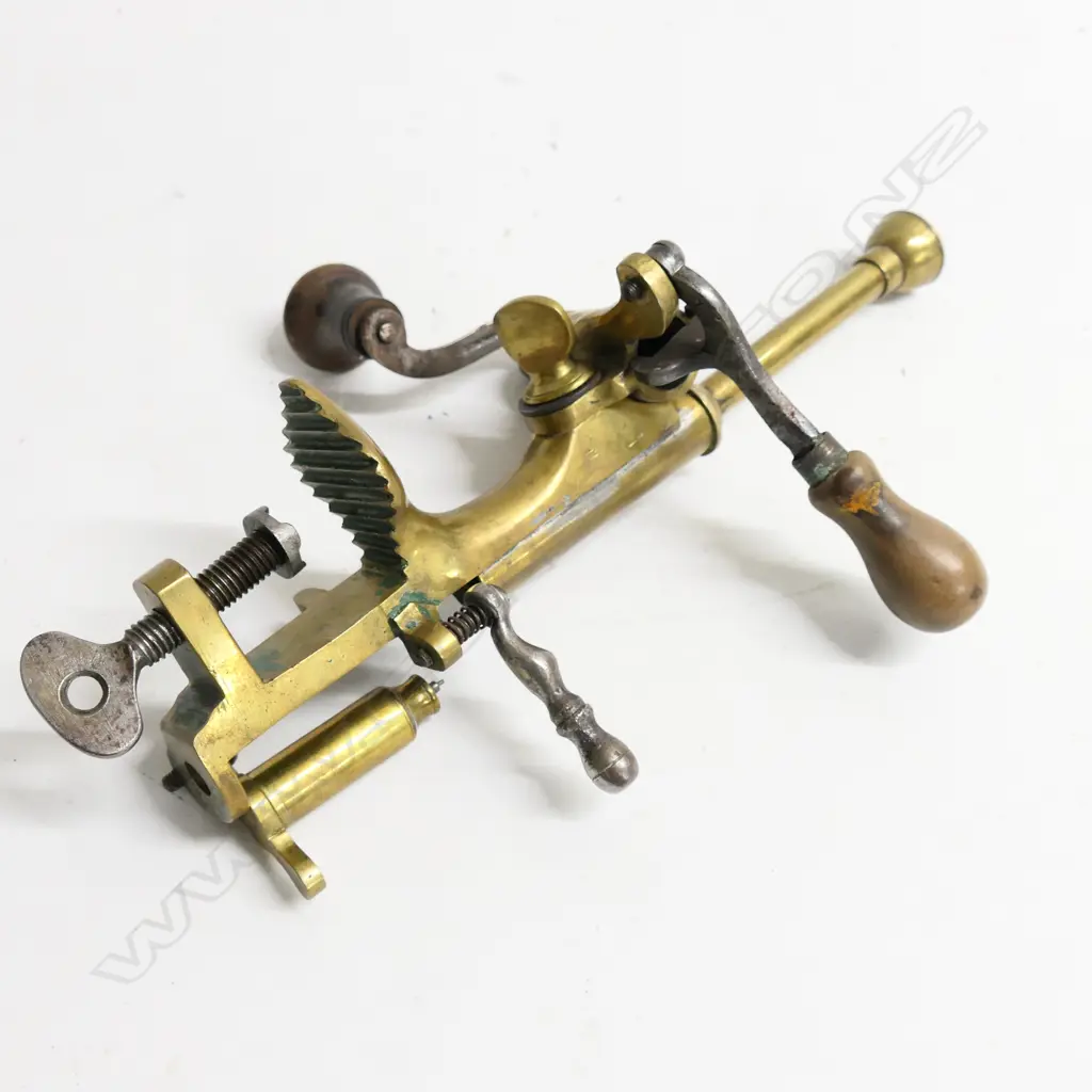 A brass and steel 12 gauge shotgun cartridge reloading tool complete with swing out primer pocket cleaner +..., Image 1++