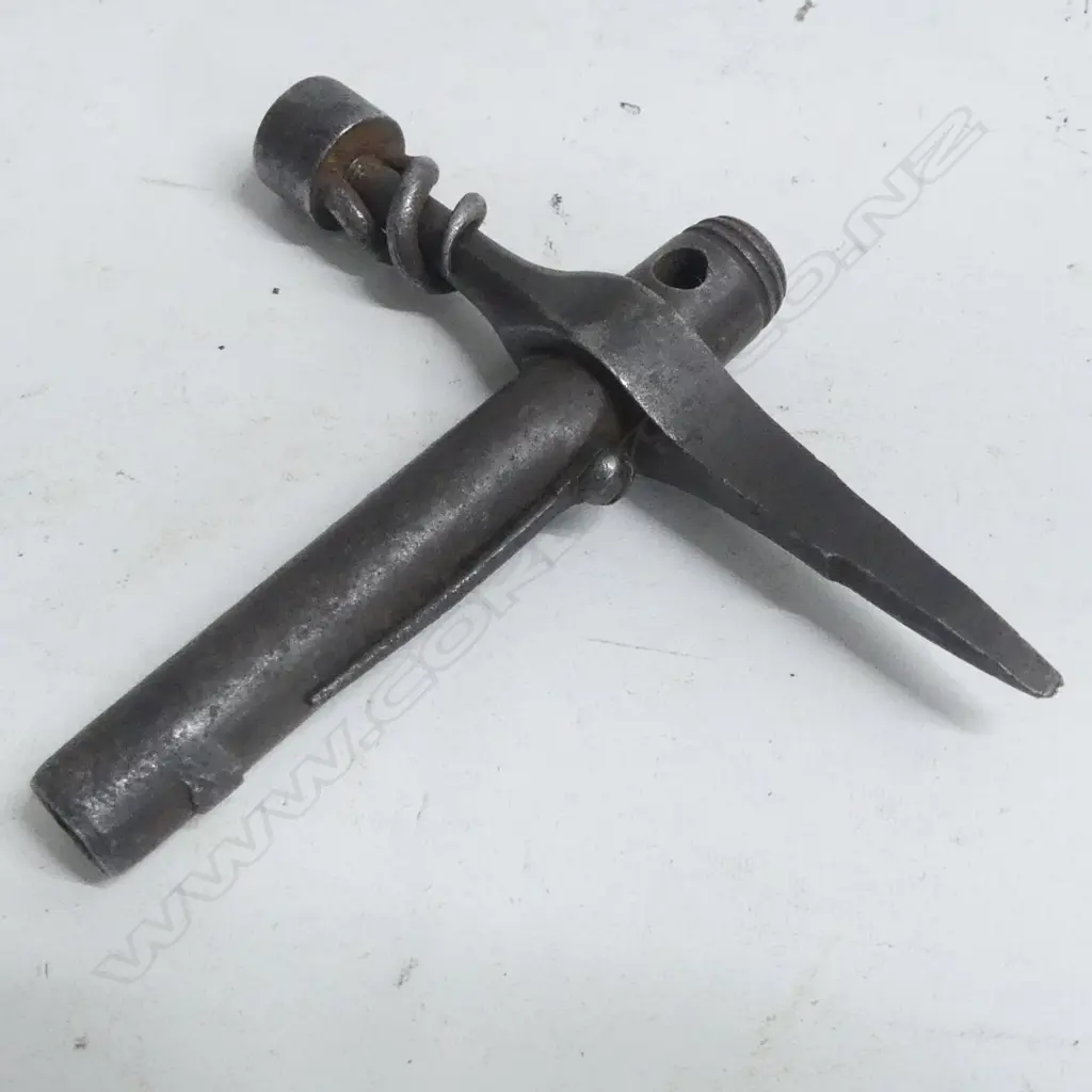 An Enfield Sergeant's wrench combination-tool, circa 1858, T-shaped with screw, wrench, pick and driver. Image 1++