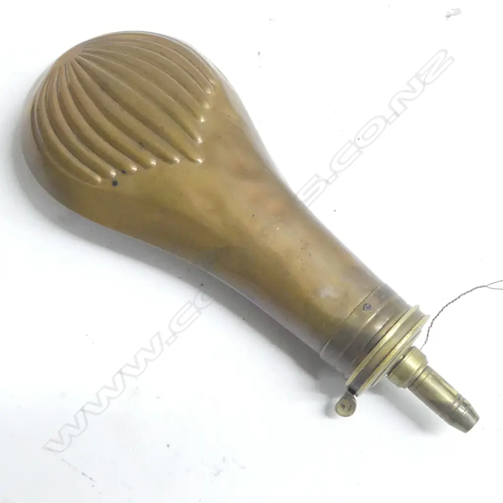A Dixon panel shell pattern rifle powder flask. Image 1++