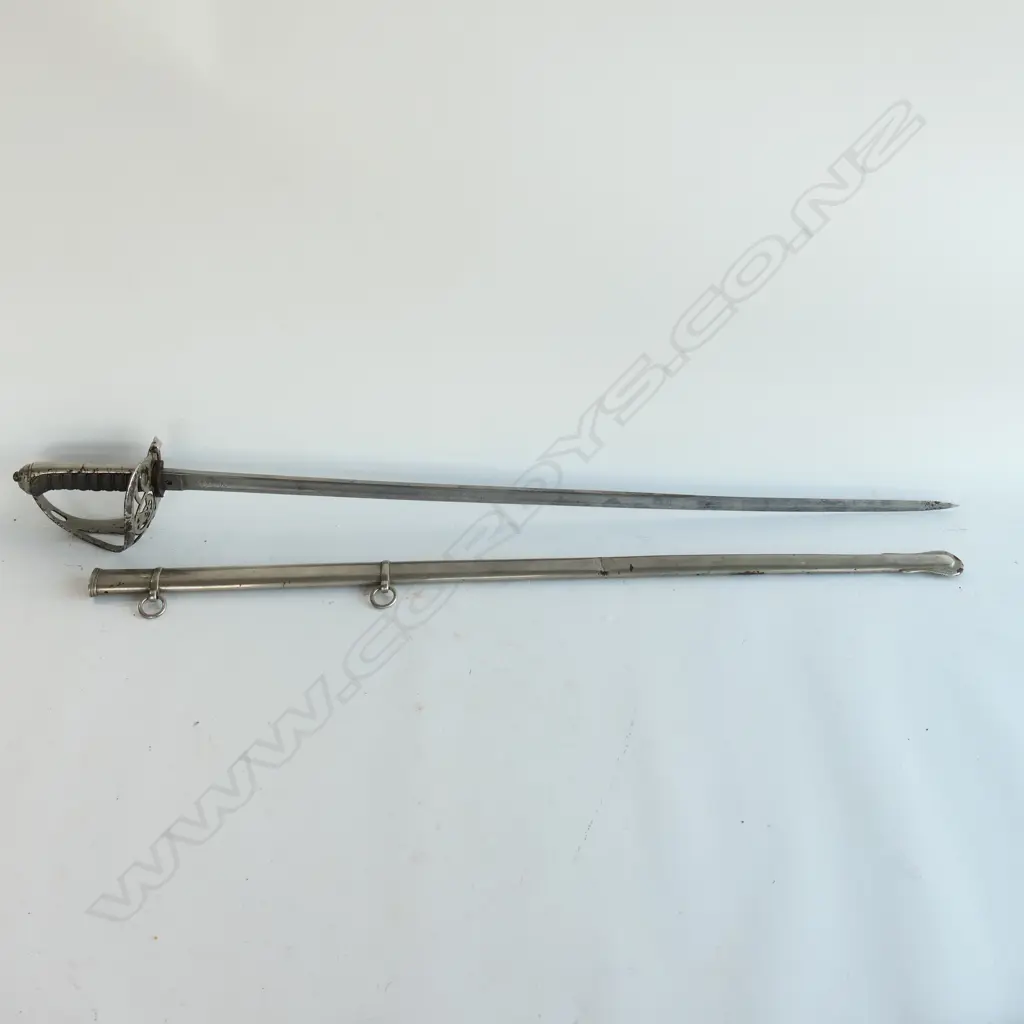 An 1827 pattern Rifle Volunteer's sword, nickel plated hilt with open swept guard, bugle cypher, Image 1++