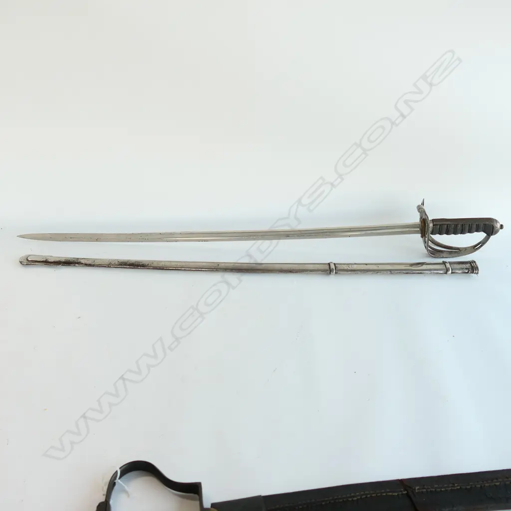 An 1827 pattern Rifle Volunteer's sword, nickel plated hilt with open swept guard with bugle cypher, Image 1++