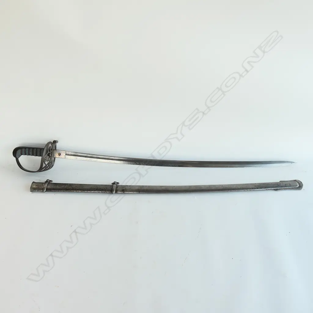 An 1827/1866 pattern Victorian Rifle Regiment Officer's sword and scabbard. With engraved and crested blade, sharkskin wire bound grip, Image 1++