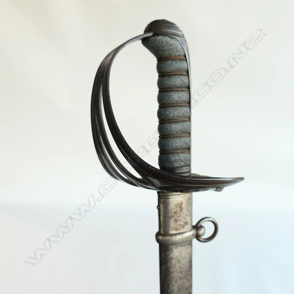 An 1827/1866 pattern Victorian Rifle Regiment Officer's sword and scabbard. With engraved and crested blade, sharkskin wire bound grip, Image 1++