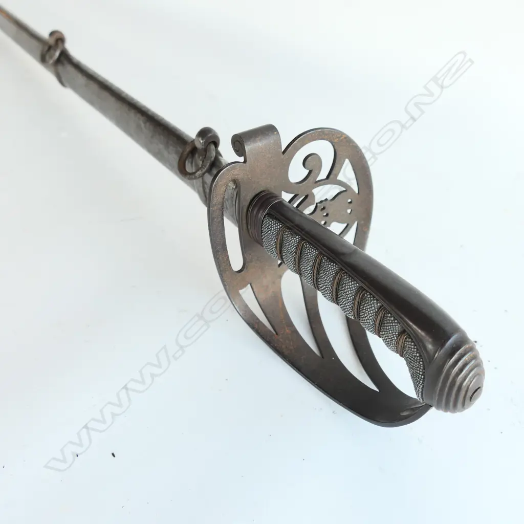 An 1827/1866 pattern Victorian Rifle Regiment Officer's sword and scabbard. With engraved and crested blade, sharkskin wire bound grip, Image 1++