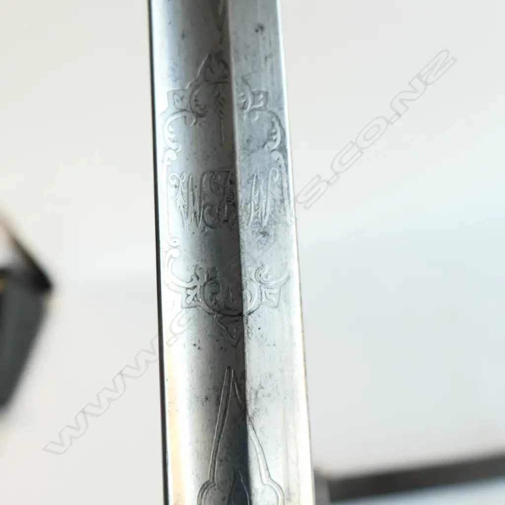 An 1827/1866 pattern Victorian Rifle Regiment Officer's sword and scabbard. With engraved and crested blade, sharkskin wire bound grip, Image 1++
