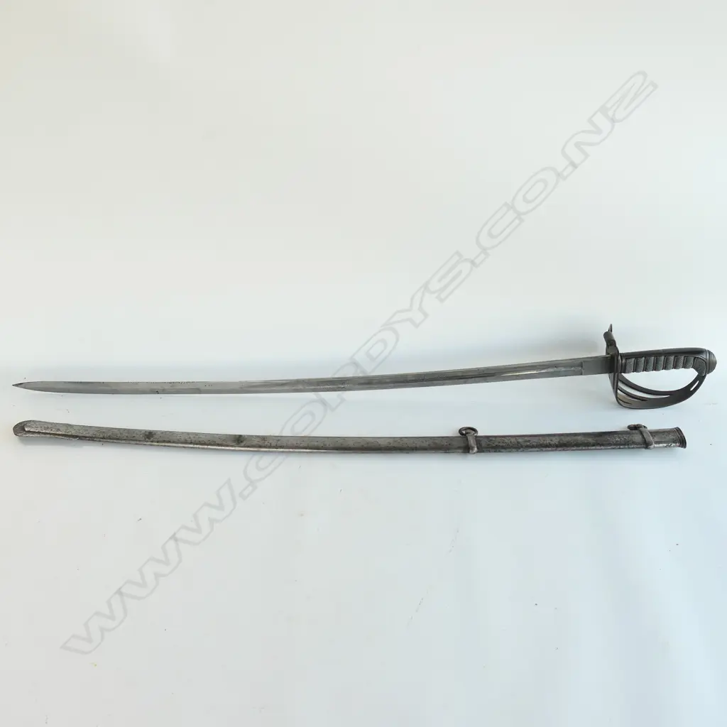 An 1827/1866 pattern Victorian Rifle Regiment Officer's sword and scabbard. With engraved and crested blade, sharkskin wire bound grip, Image 1++