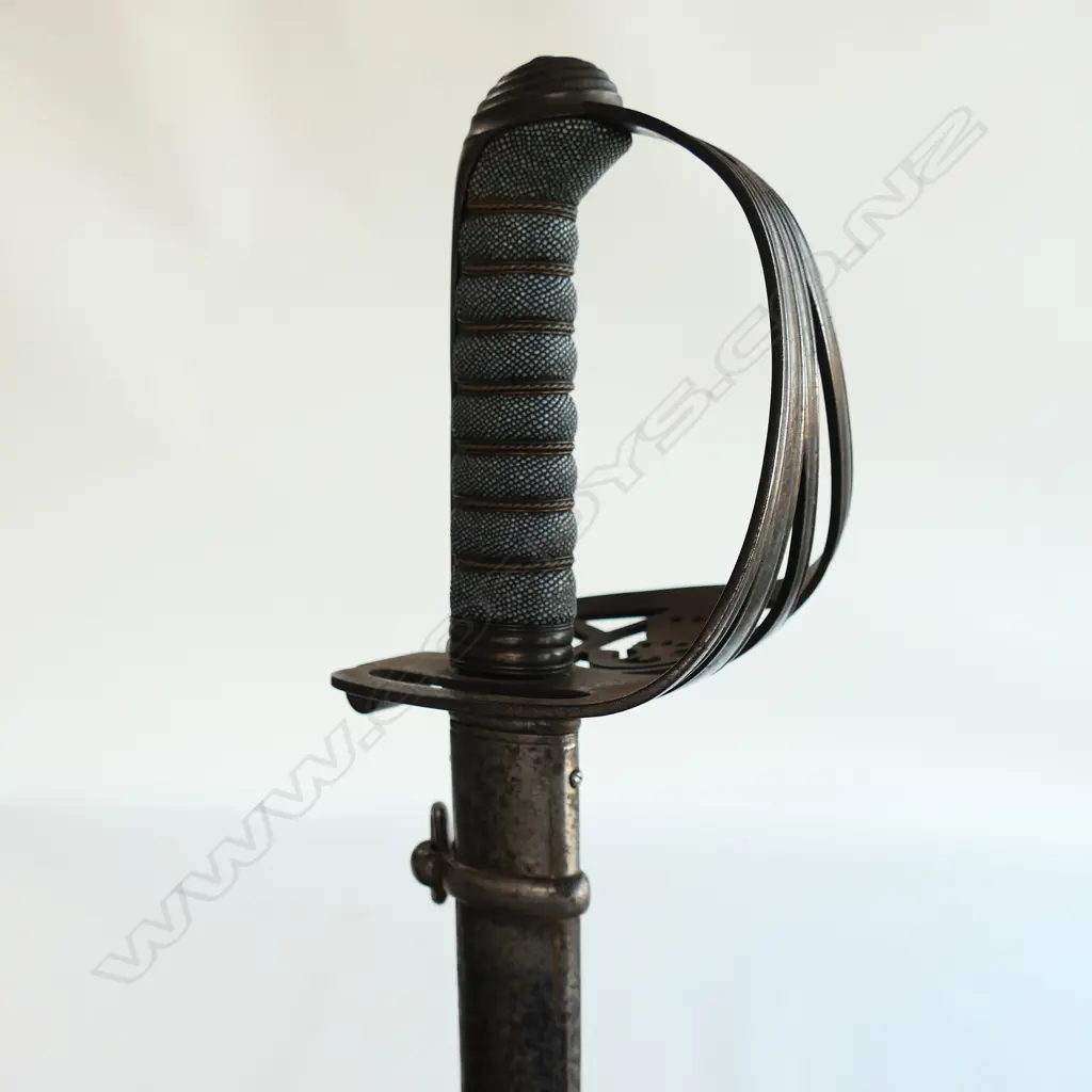 An 1827/1866 pattern Victorian Rifle Regiment Officer's sword and scabbard. With engraved and crested blade, sharkskin wire bound grip, Image 1++