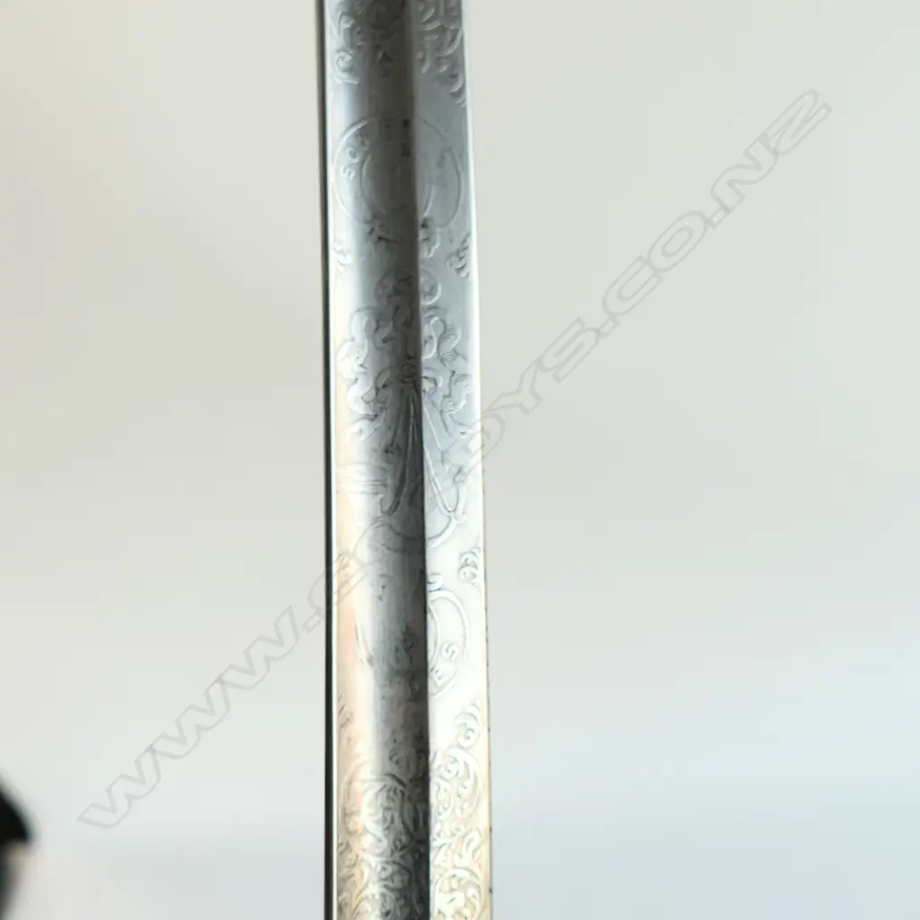 An 1827/1866 pattern Victorian Rifle Regiment Officer's sword and scabbard. With engraved and crested blade, sharkskin wire bound grip, Image 1++